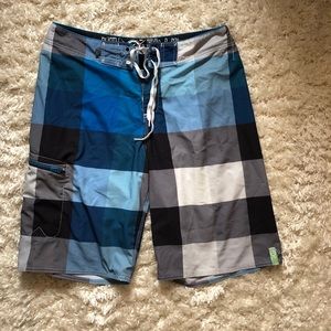 Plaid swim trunks